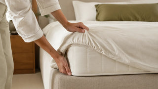 Measuring the pocket depth needed for a queen fitted sheet
